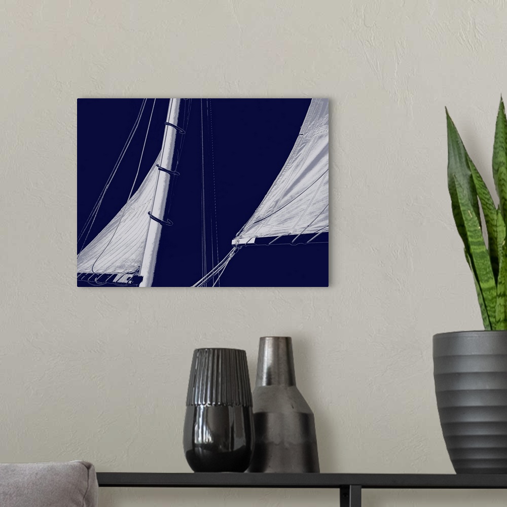 A modern room featuring Indigo and white illustration of sails from a sailboat.