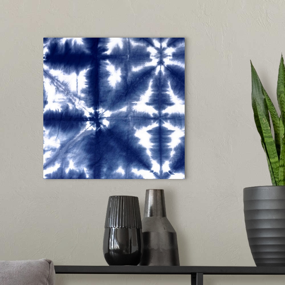 A modern room featuring Square abstract shibori print in indigo and white.
