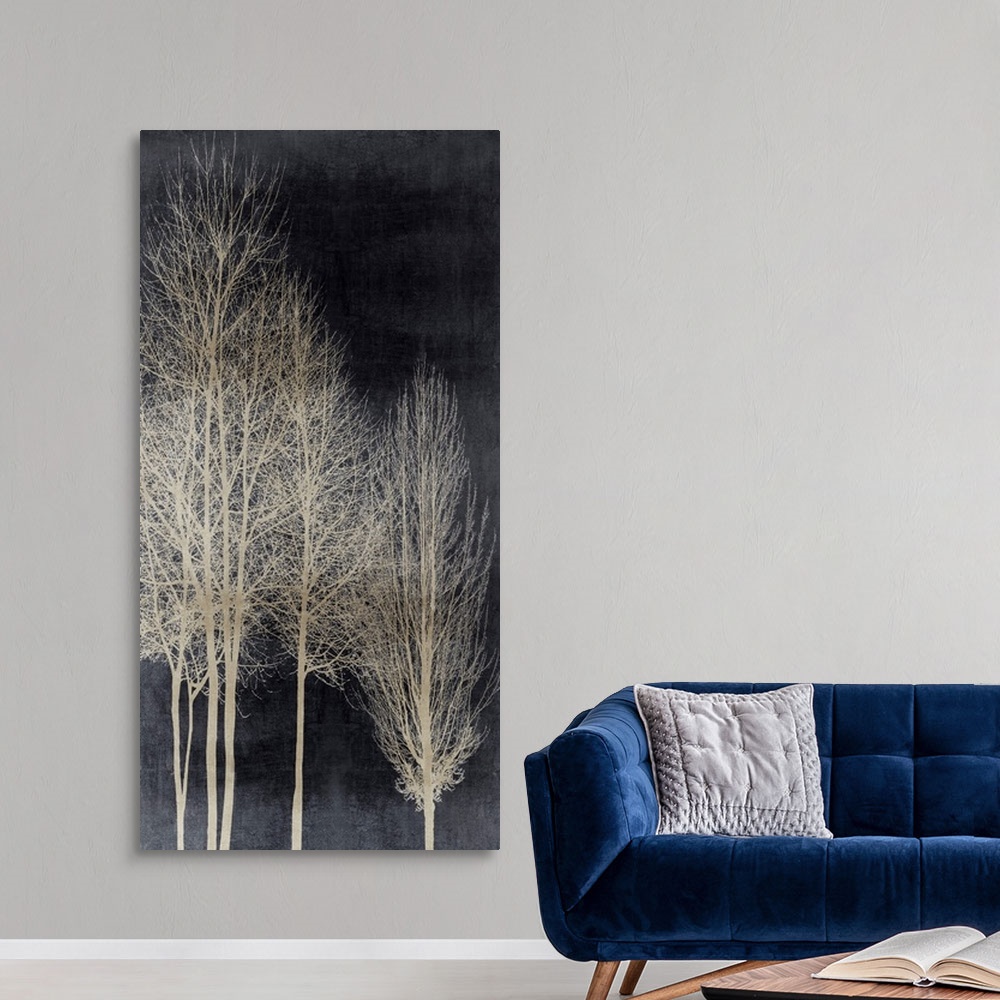 A modern room featuring Decorative artwork featuring an aged silver silhouette of leafless trees over a distressed backgr...