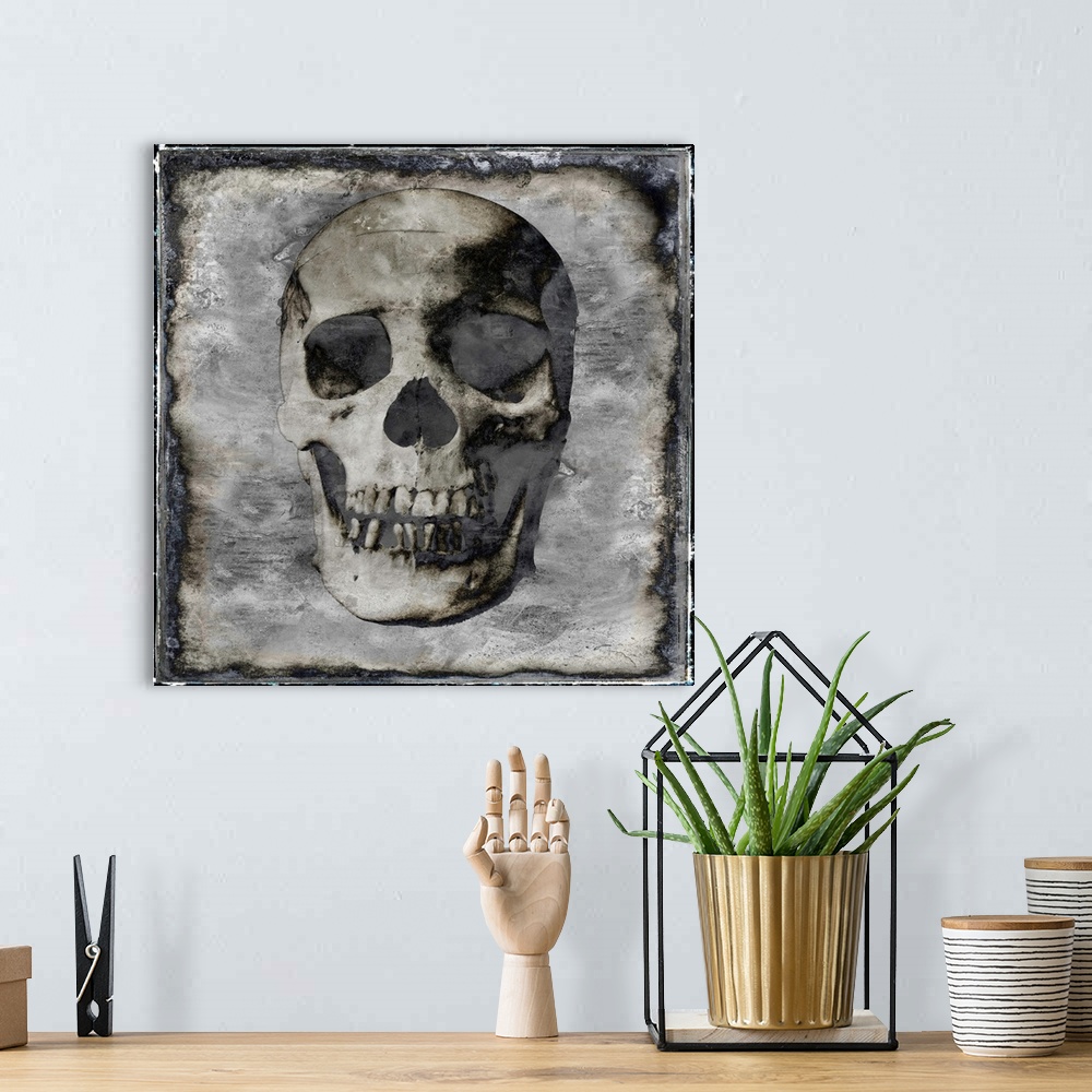 A bohemian room featuring Square illustration of a skull with a weathered background in silver, white, gold, and black.