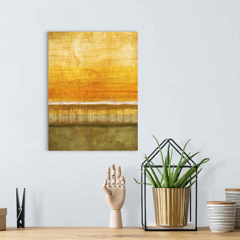 A bohemian room featuring Abstract painting with a white horizon line and a yellow and orange sky with olive green below.