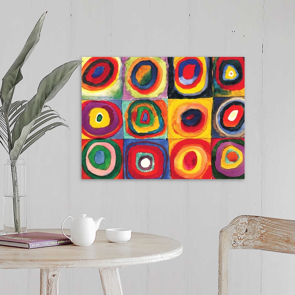 A farmhouse room featuring A Contemporary painting of colorful rings of circles within squares.