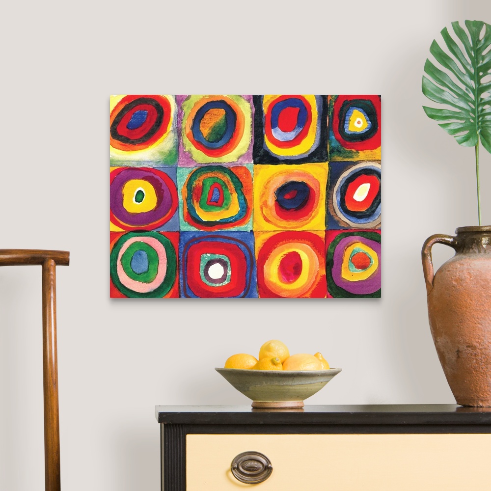 A traditional room featuring A Contemporary painting of colorful rings of circles within squares.