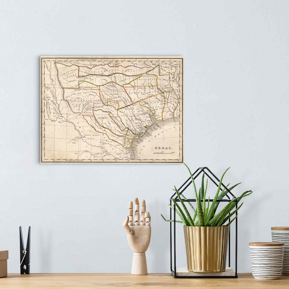 A bohemian room featuring Antique historical map of Texas with highlighted boarders.