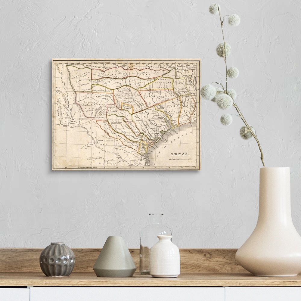 A farmhouse room featuring Antique historical map of Texas with highlighted boarders.