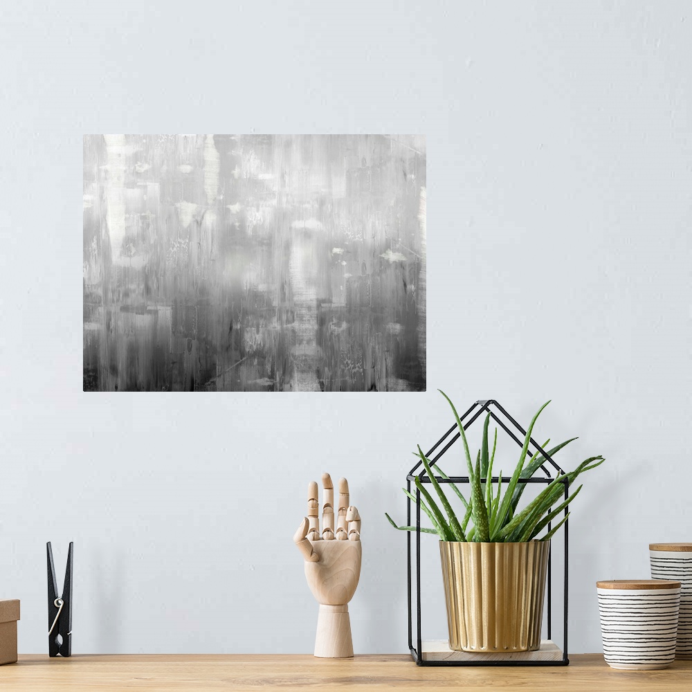 A bohemian room featuring Large abstract painting with shades of gray streaking down the canvas.