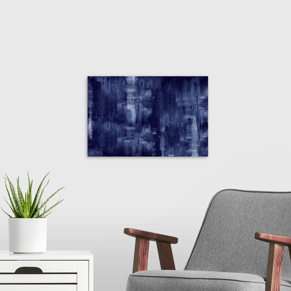 A modern room featuring Large abstract painting created with deep indigo hues and small streaks of white.