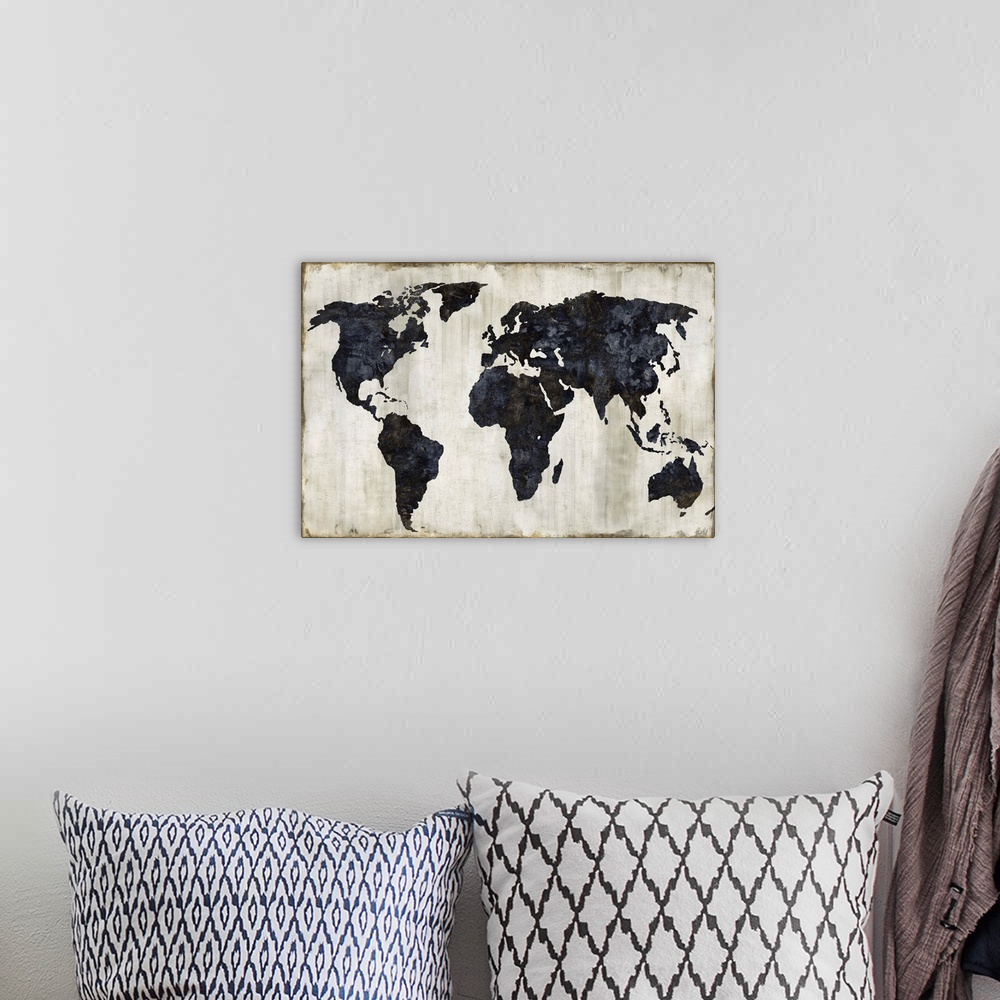 A bohemian room featuring World map in black, silver, gold, and white.