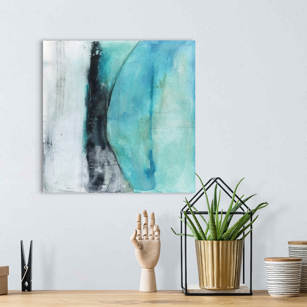 A bohemian room featuring Square abstract painting created with shades of blue and black with a section of white-gray on th...