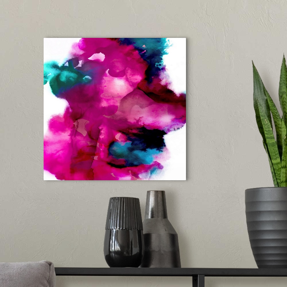 A modern room featuring Square abstract art made with shades of blue and bright pink on a white background.