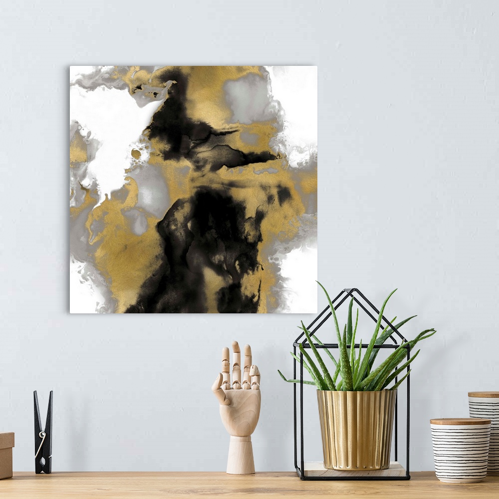 A bohemian room featuring Square abstract art in gold, black, and silver on a white background.