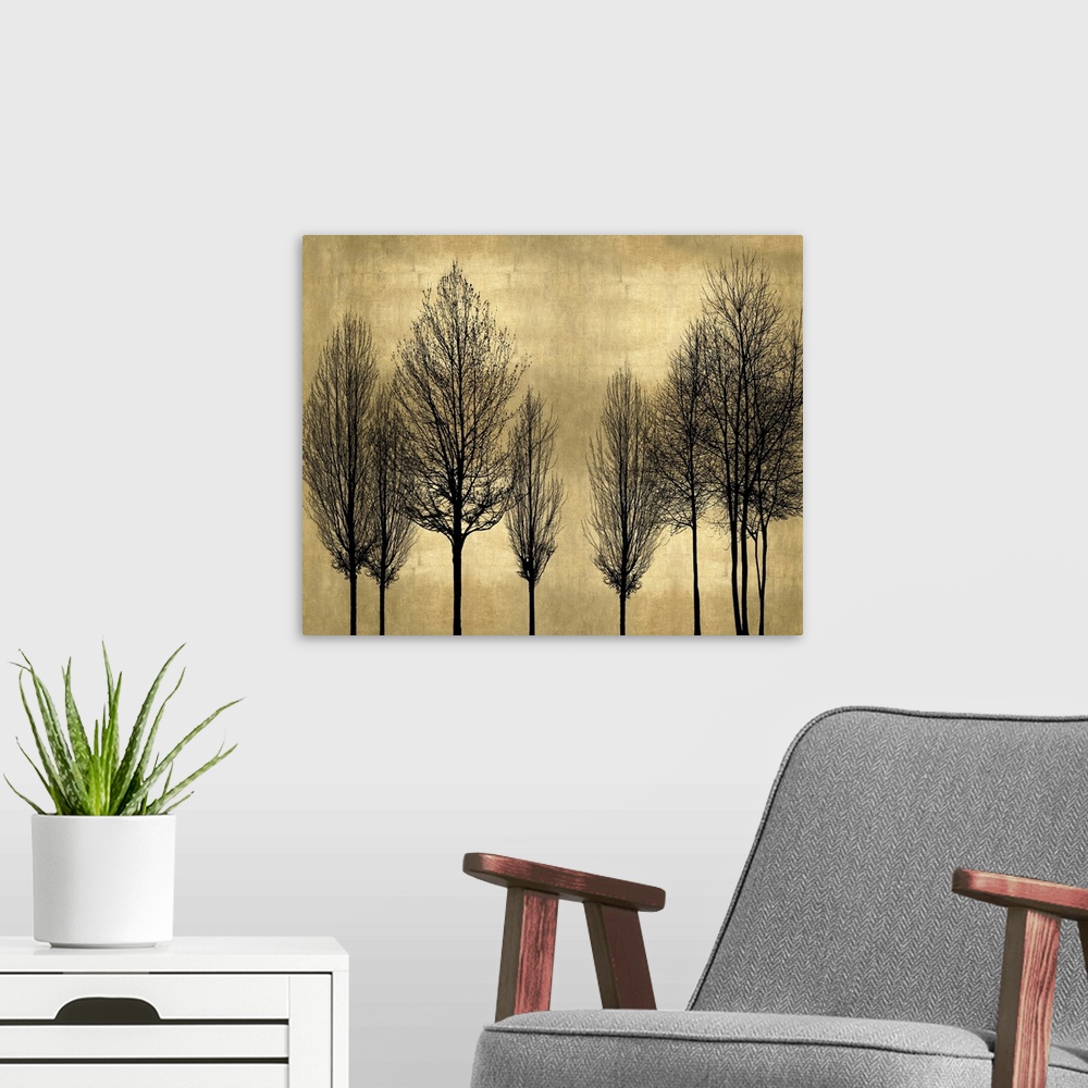 A modern room featuring Decorative artwork featuring a black silhouette of leafless trees over a distressed background