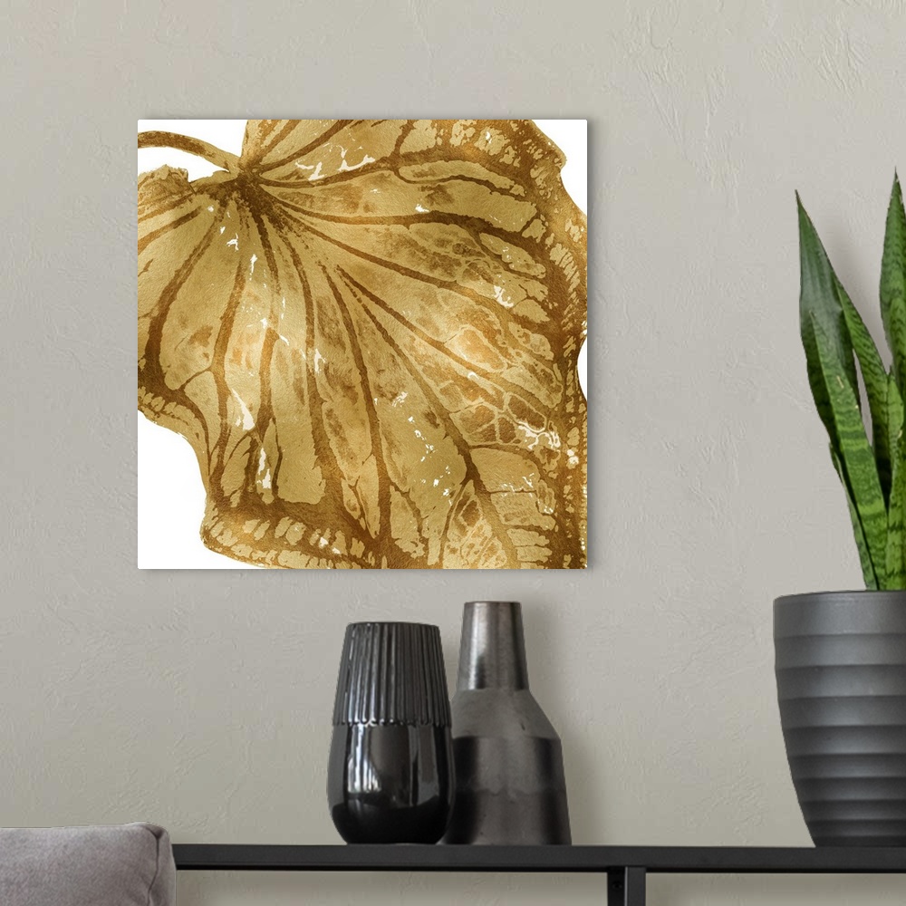 A modern room featuring Square decor with a metallic gold silhouette of a palm leaf on a solid white background.