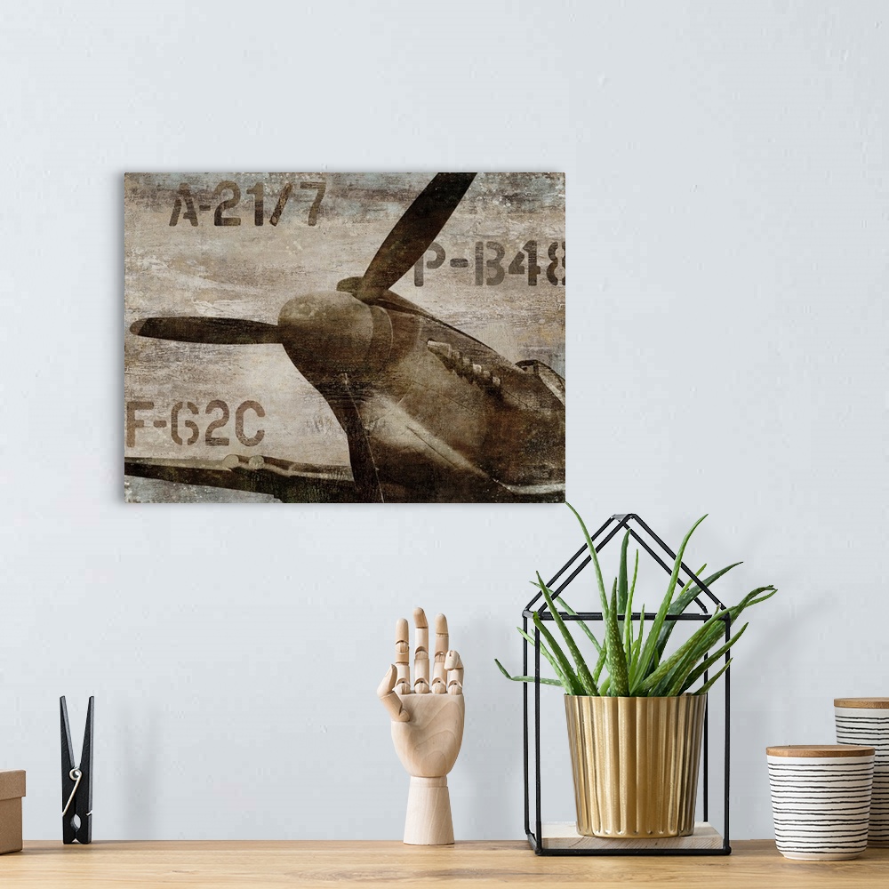 A bohemian room featuring Vintage decor with an illustration of an old airplane propeller in dark sepia tones.