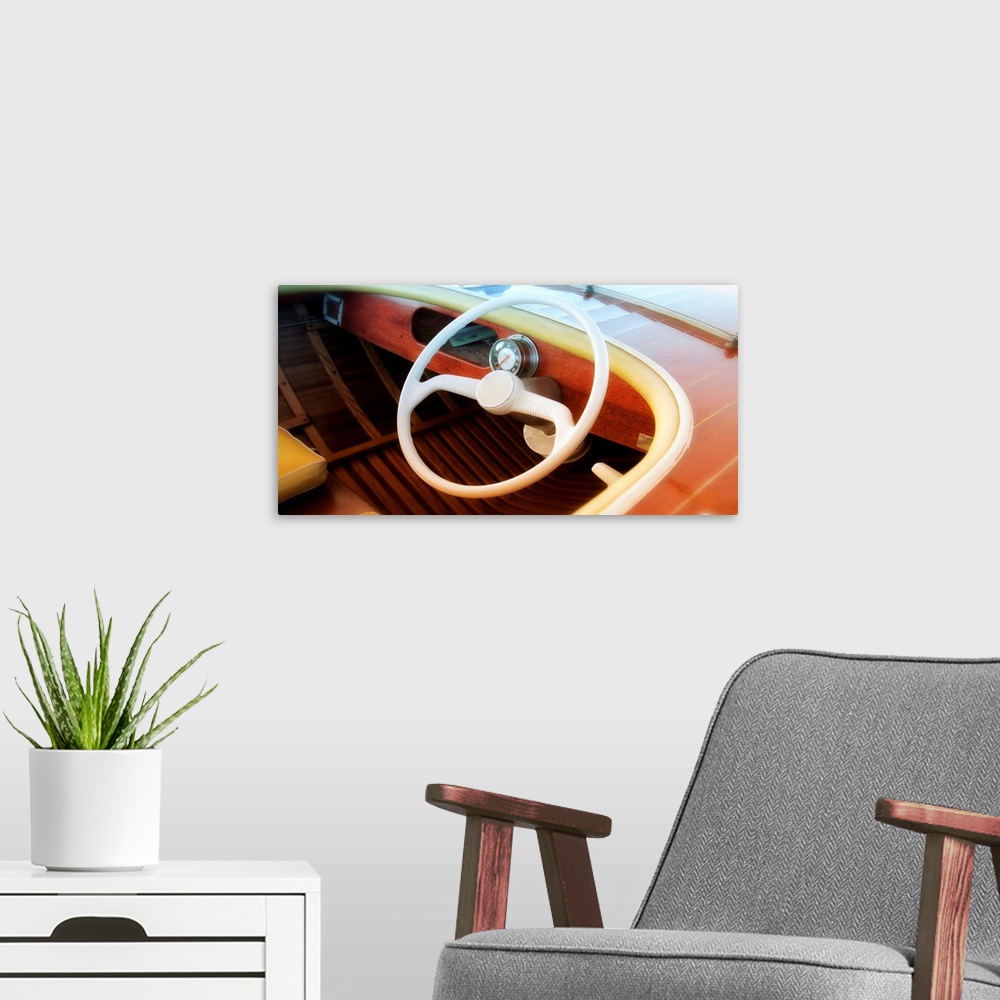 A modern room featuring Photograph of the drivers side of a vintage speed boat with a blurred vignette.