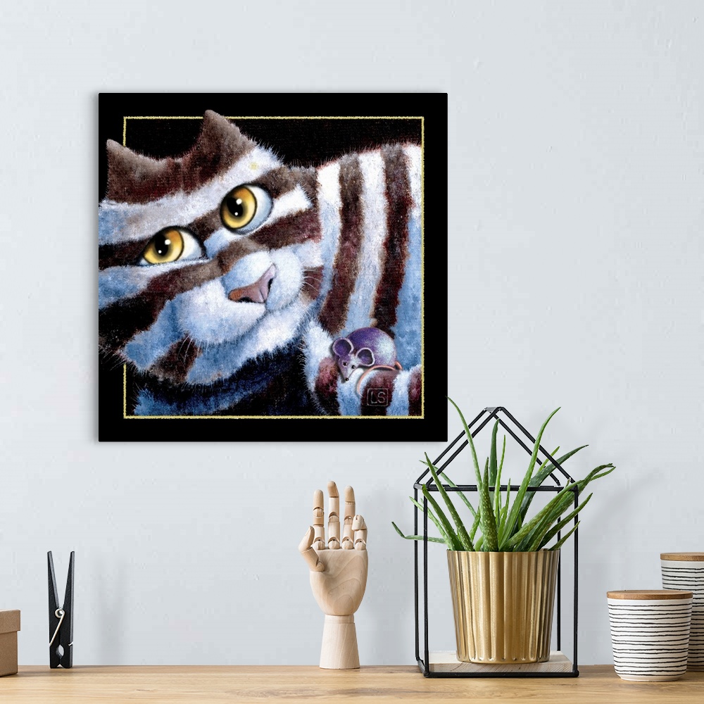 A bohemian room featuring Square painting of a white and black striped cat with a blue mouse on its tail.