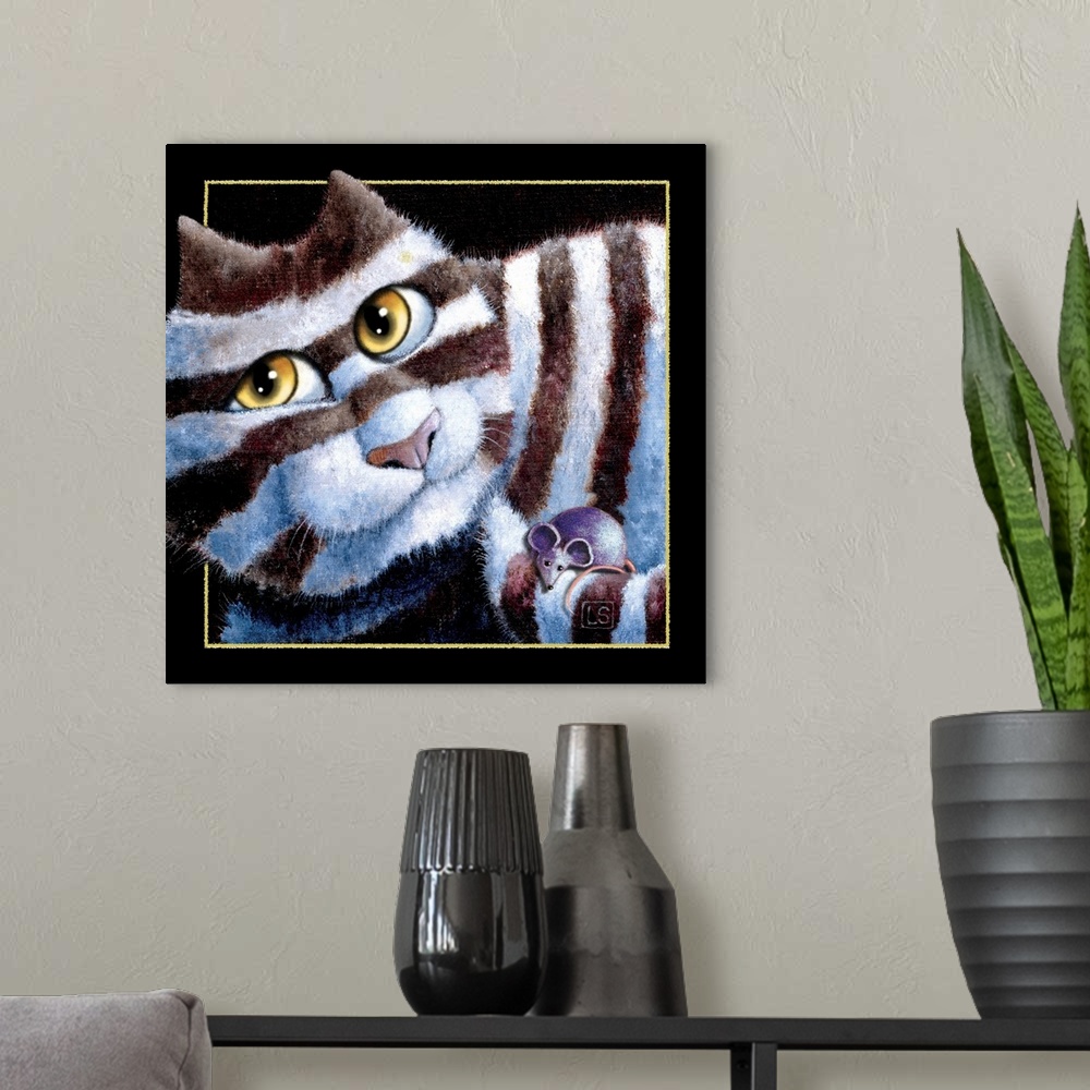 A modern room featuring Square painting of a white and black striped cat with a blue mouse on its tail.