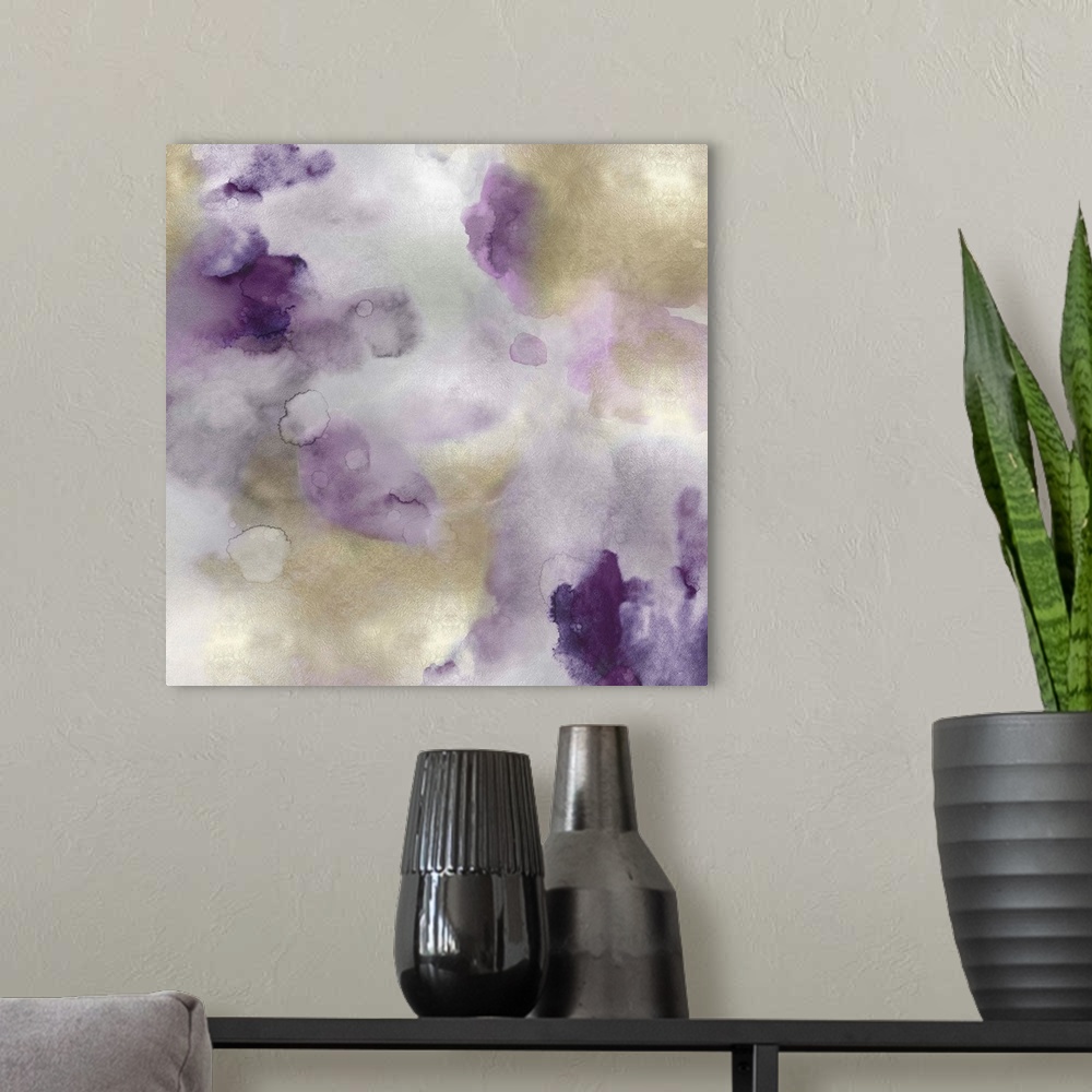 A modern room featuring Abstract painting with purple and gold hues splattered together on a silver background.
