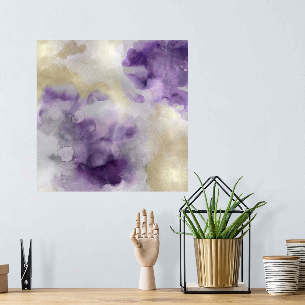 A bohemian room featuring Abstract painting with purple and gold hues splattered together on a silver background.