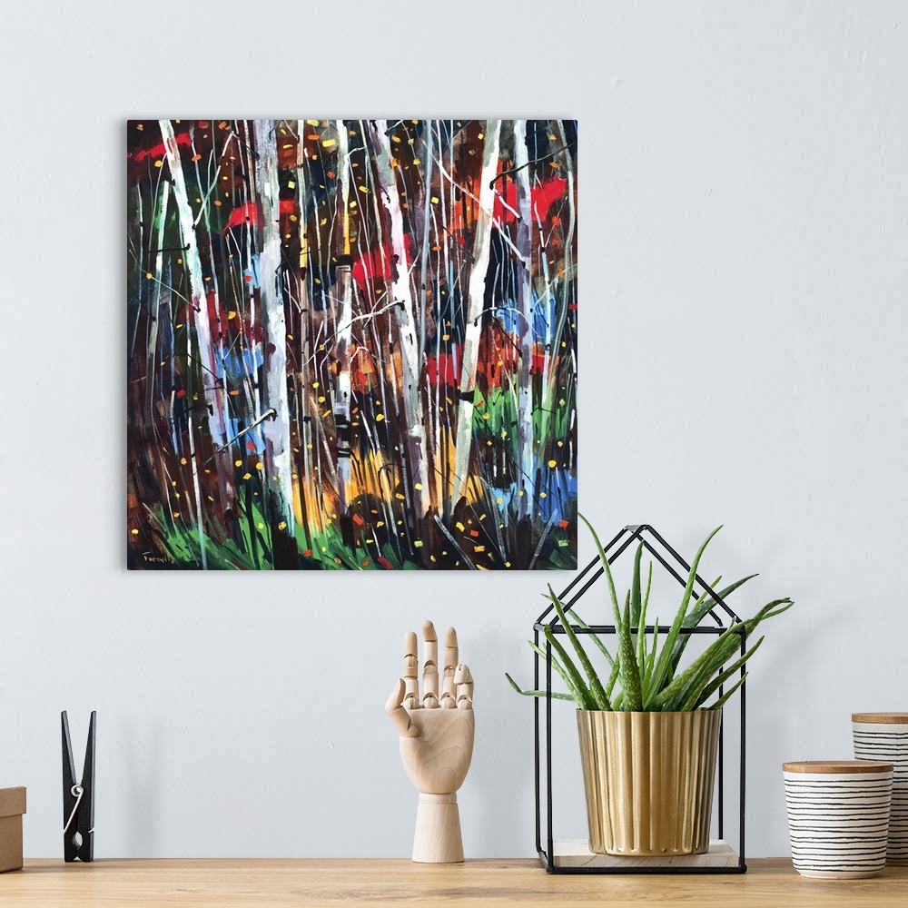 A bohemian room featuring A square abstract painting of a forest of birch trees with black, red, yellow and red colors in t...