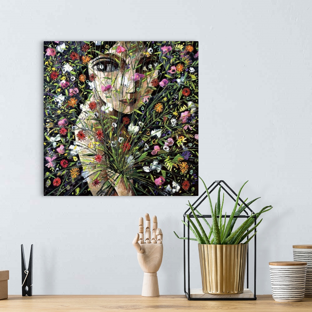 A bohemian room featuring A square portrait of a woman behind a large bouquet of wild flowers on a black background, painte...
