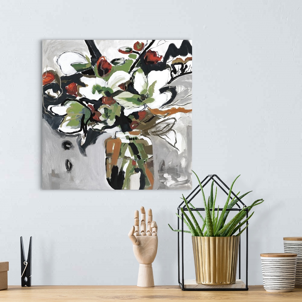 A bohemian room featuring Square floral abstract of a vase of large white flowers with small red roses throughout.