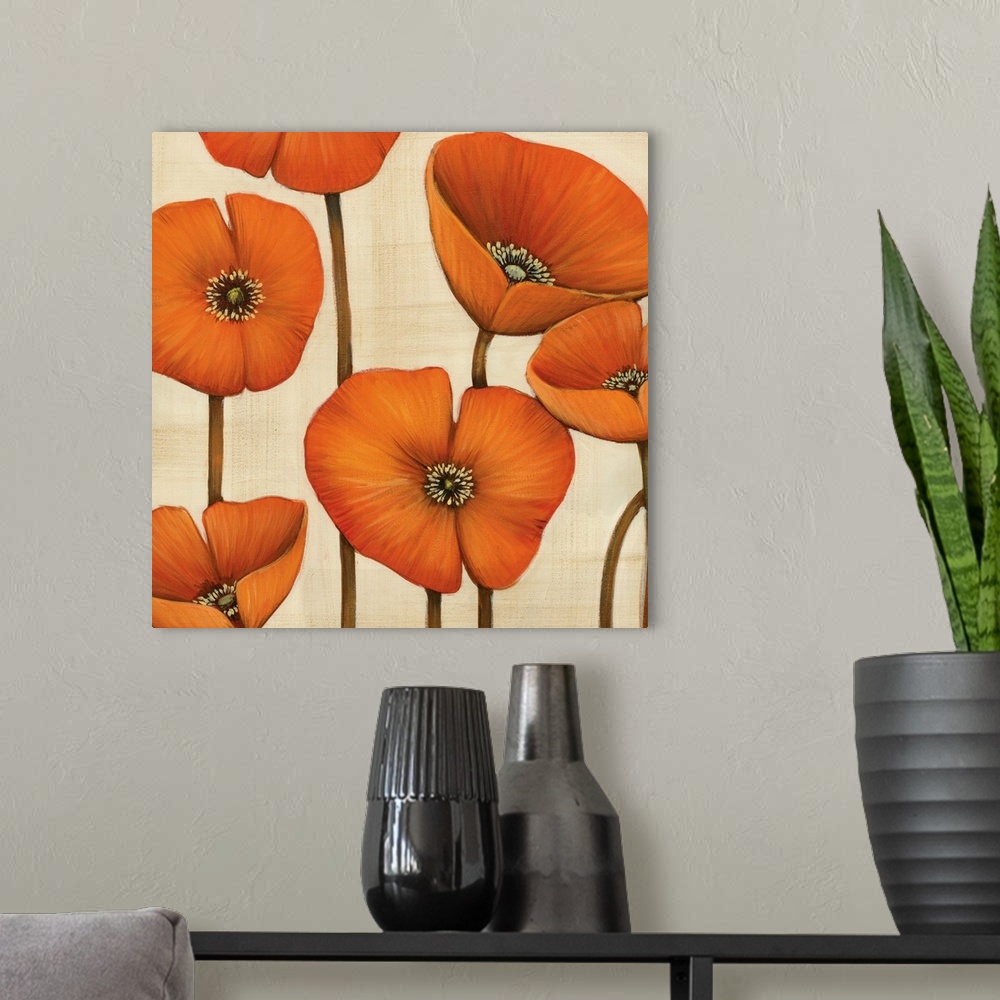 A modern room featuring Square contemporary artwork of orange poppy flowers against a neutral backdrop.