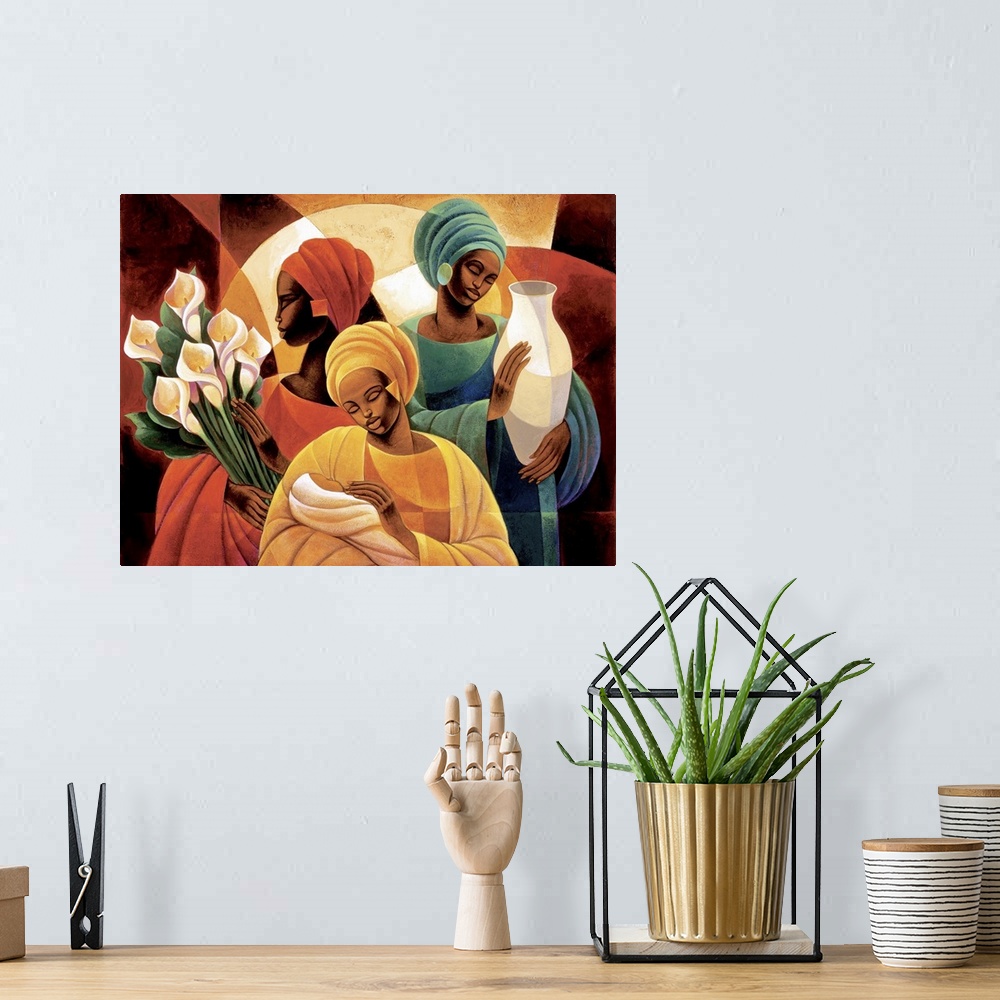 A bohemian room featuring Artwork of three African women, one holding lilies, one holding a vase, and one holding a child.