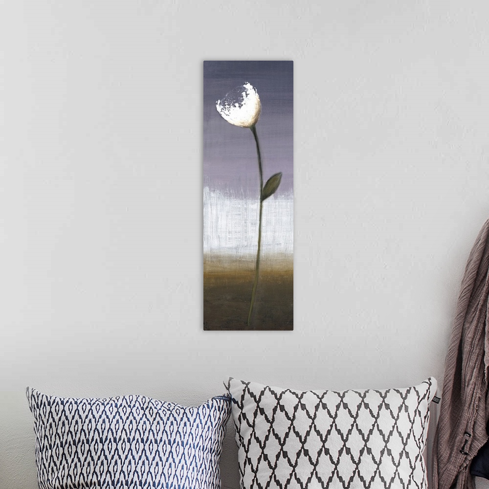 A bohemian room featuring A long vertical painting of a single white flower on a long stem with a textured neutral background.