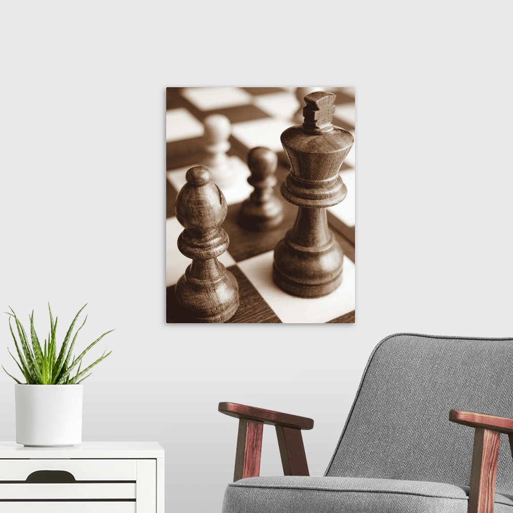 A modern room featuring Sepia toned photo of chess pieces on a game board.