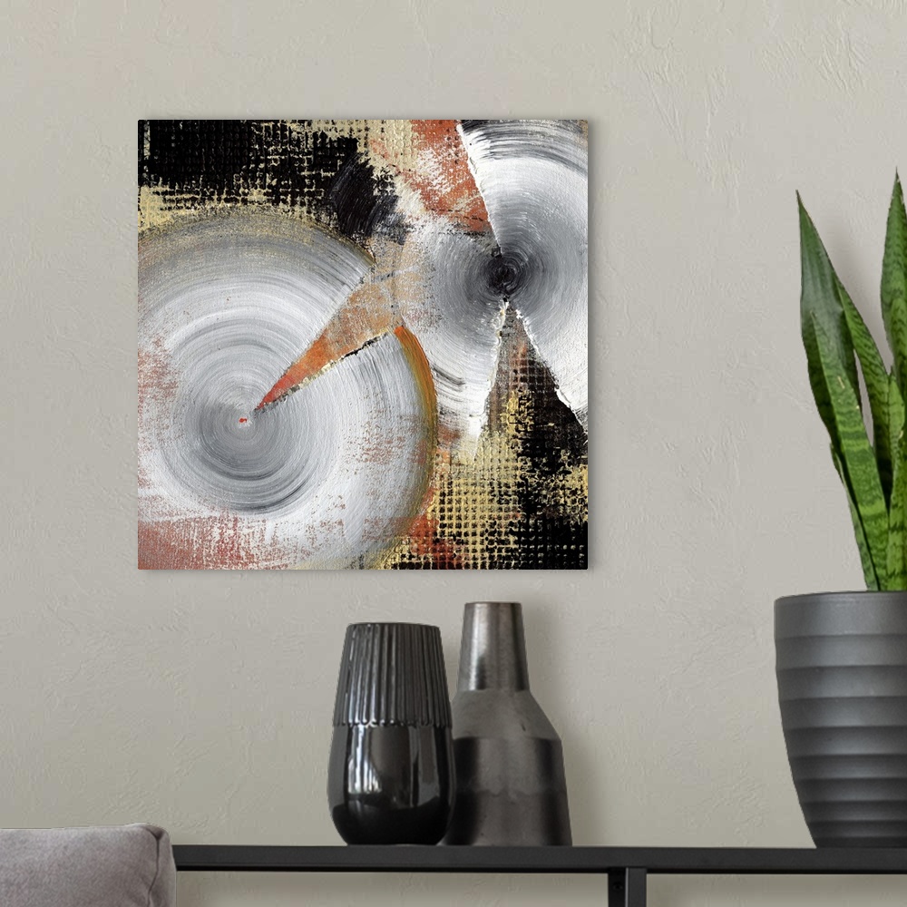 A modern room featuring A square abstract of silver spirals with textured gold and black backdrop.