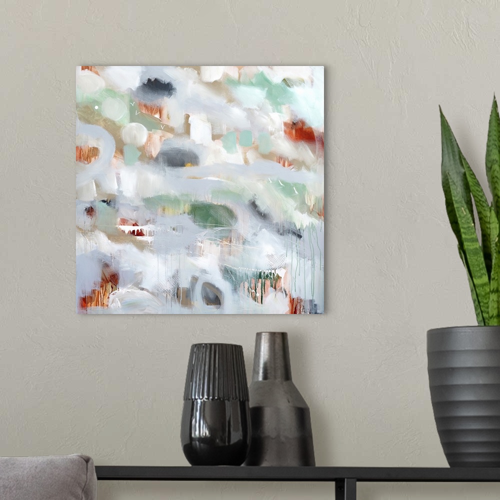 A modern room featuring Square abstract painting of spots of color peeping through light gray with small drips of paint a...