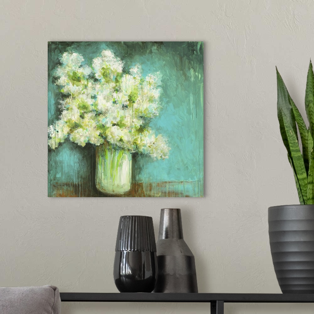 A modern room featuring Square painting of a large vase full of hydrangeas in white and green done in streaks and texture...