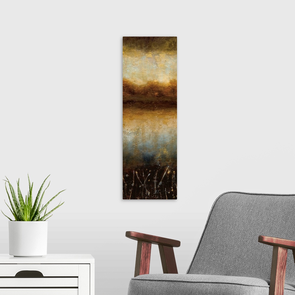 A modern room featuring A long contemporary painting of a lake landscape in textured warm colors of orange, brown and black.