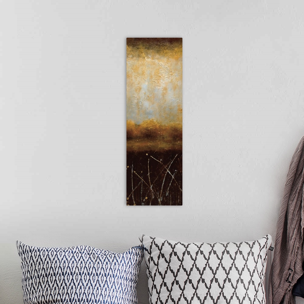 A bohemian room featuring A long contemporary painting of a lake landscape in textured warm colors of orange, brown and black.