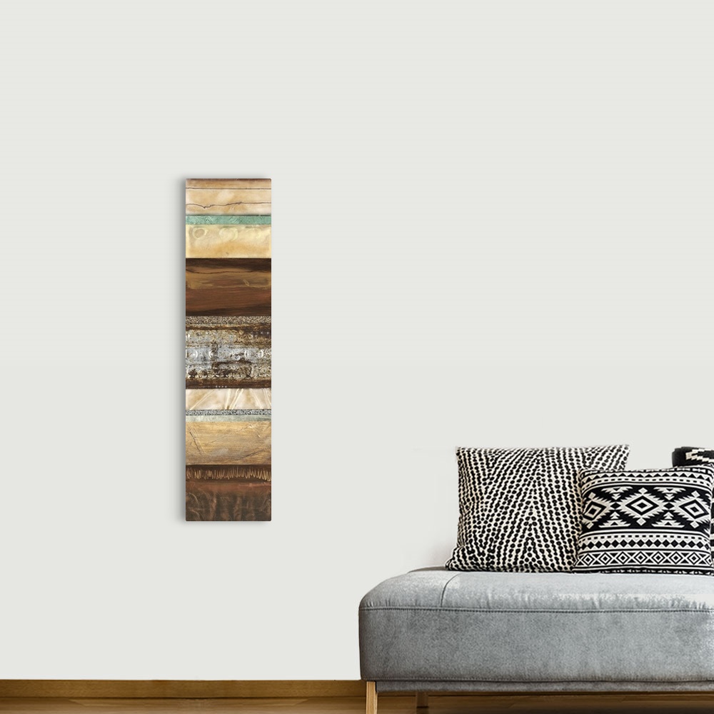 A bohemian room featuring Panoramic artwork of varies textured colors in a striped pattern.
