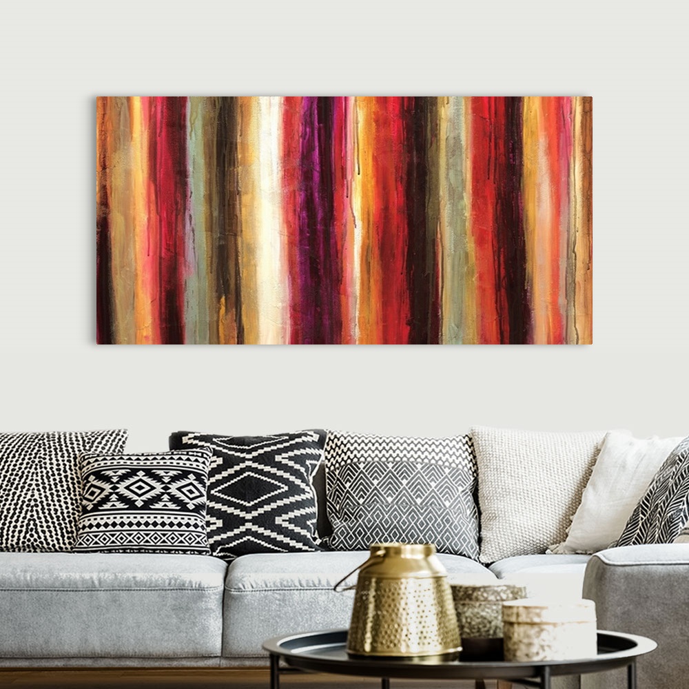 A bohemian room featuring Contemporary painting of warm tones of red, purple and orange in vertical stripes and drips of pa...