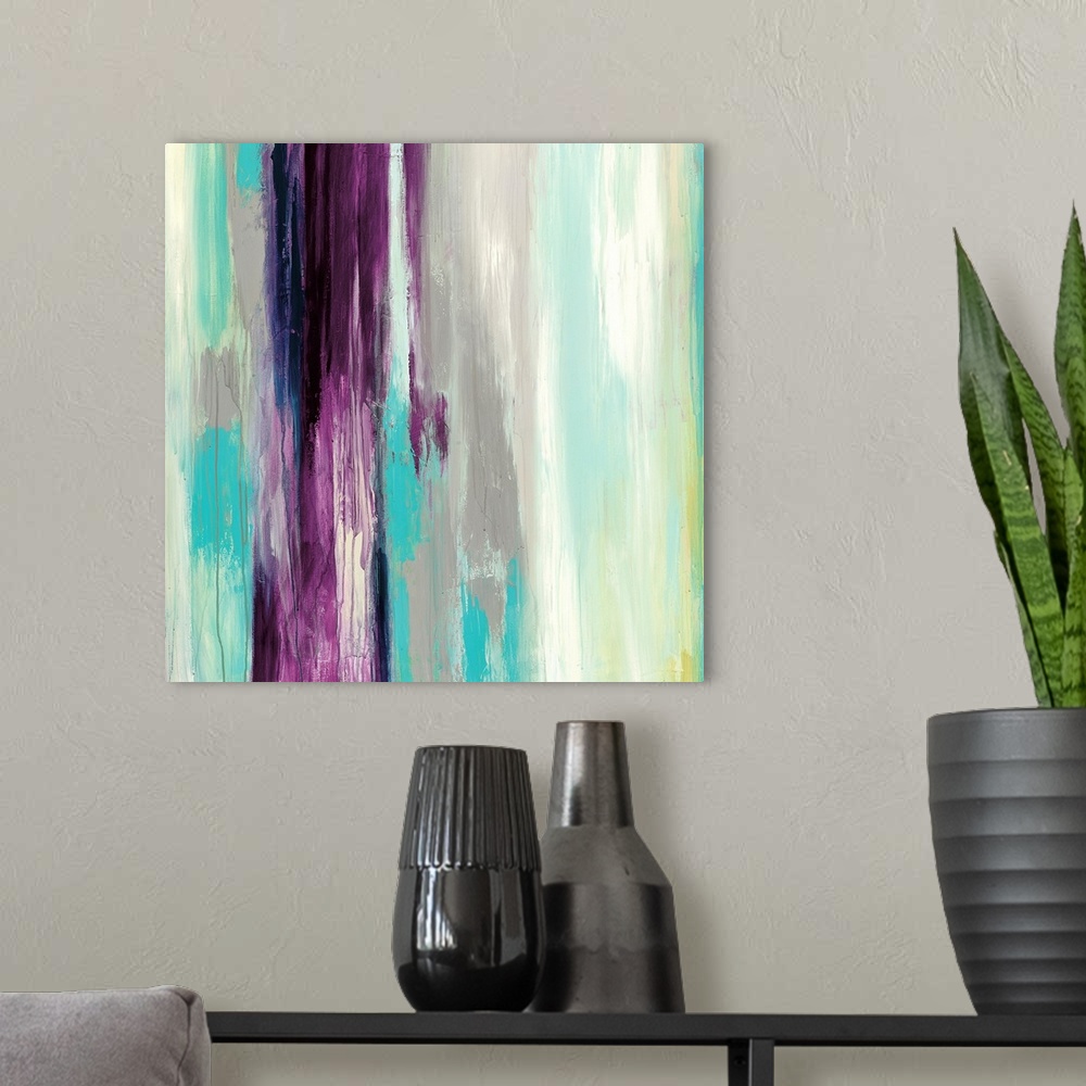 A modern room featuring Square abstract of vertical strokes of paint in teal, gray, purple and yellow.