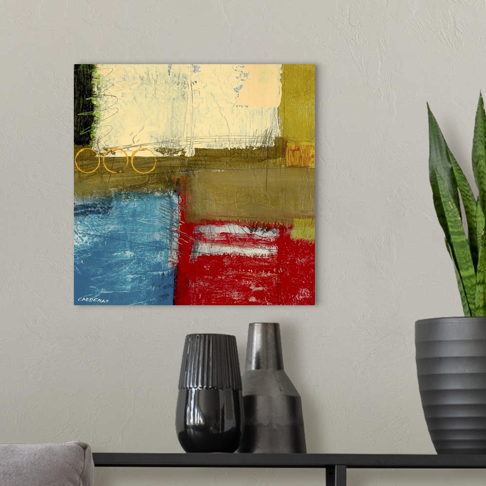 A modern room featuring Red, beige, green and blue abstract.