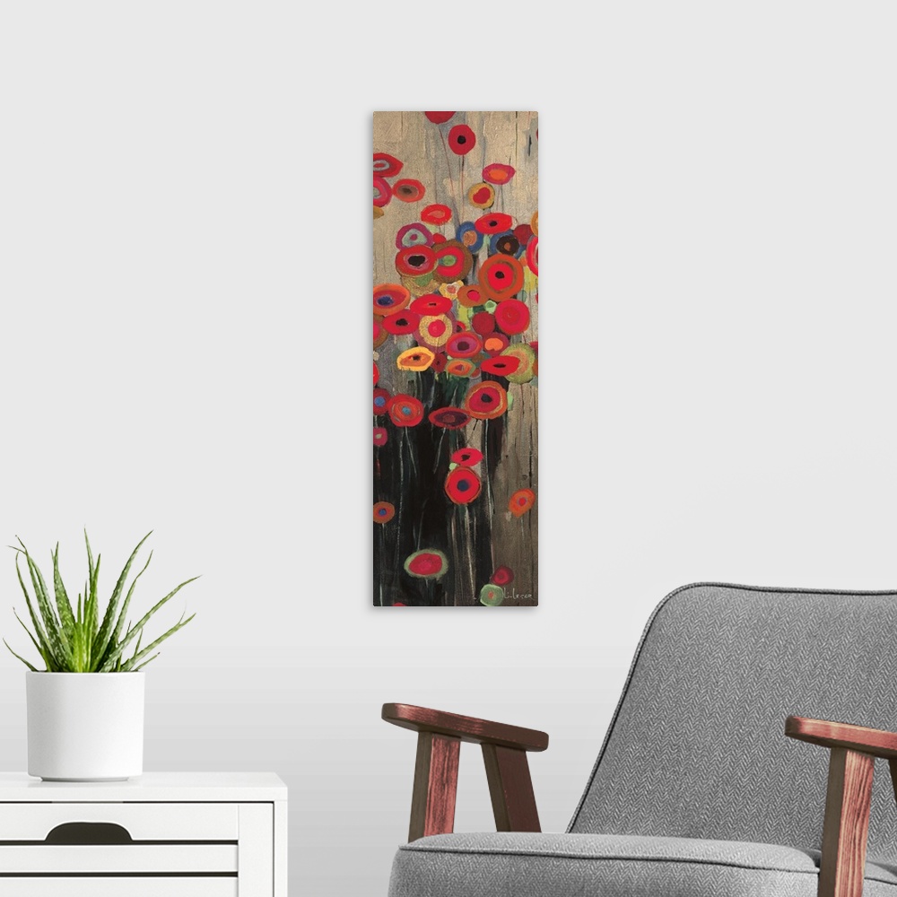 A modern room featuring A long vertical painting of a group of multi-colored poppies on a neutral backdrop.