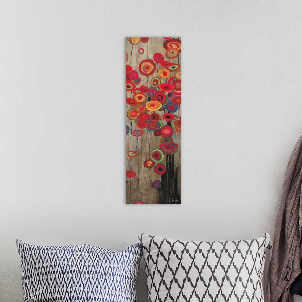 A bohemian room featuring A long vertical painting of a group of multi-colored poppies on a neutral backdrop.