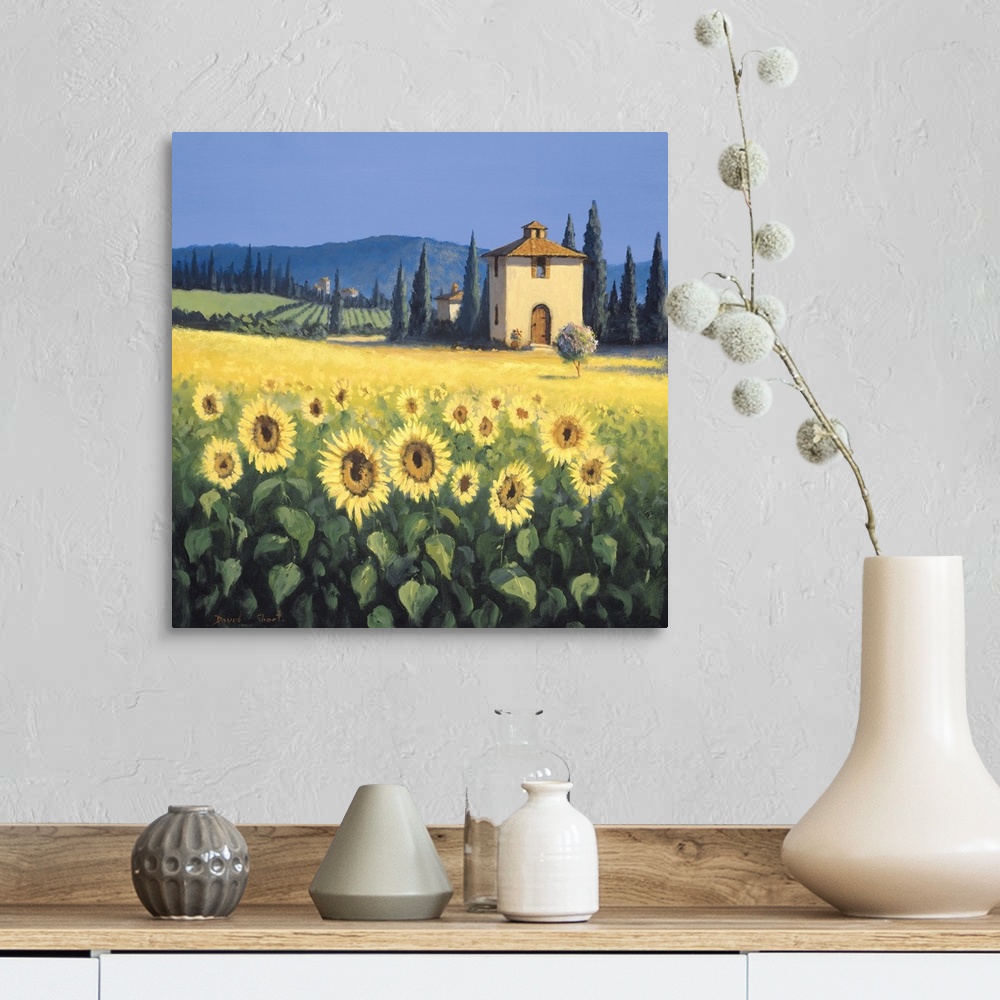 A farmhouse room featuring Painting of a field of sunflowers near a farm house in Tuscany.