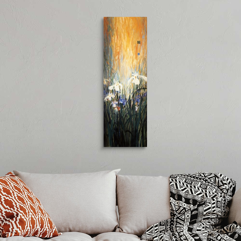 A bohemian room featuring A contemporary painting with white flowers with long grass and a bright orange background.