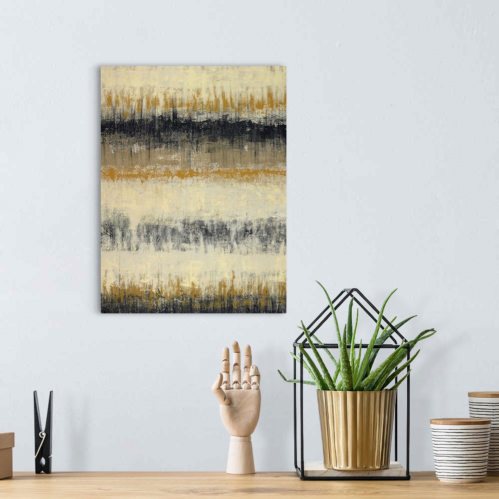 A bohemian room featuring Vertical abstract of horizontal rows of textured lines in black, beige and mustard colors.