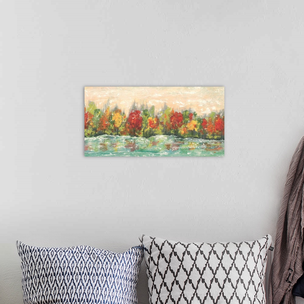 A bohemian room featuring Contemporary painting of a forest in the fall reflecting in the water.