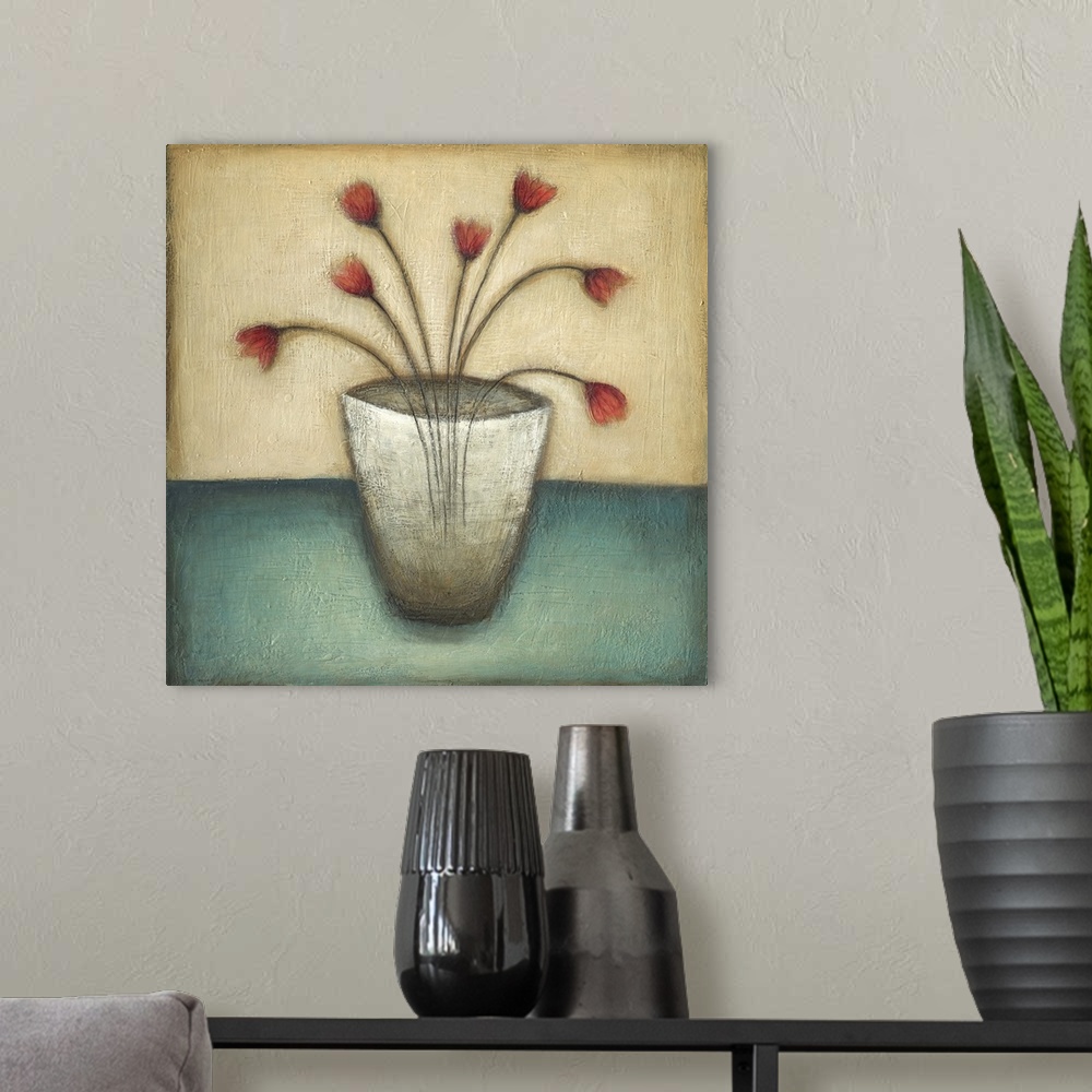 A modern room featuring Contemporary painting of red tulips within a vase in soften tones of brown, red and blue.