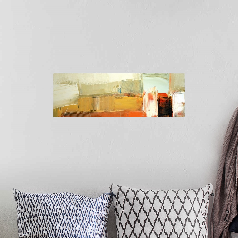 A bohemian room featuring A horizontal abstract painting in vibrant textured colors of orange, yellow and black in box shapes.
