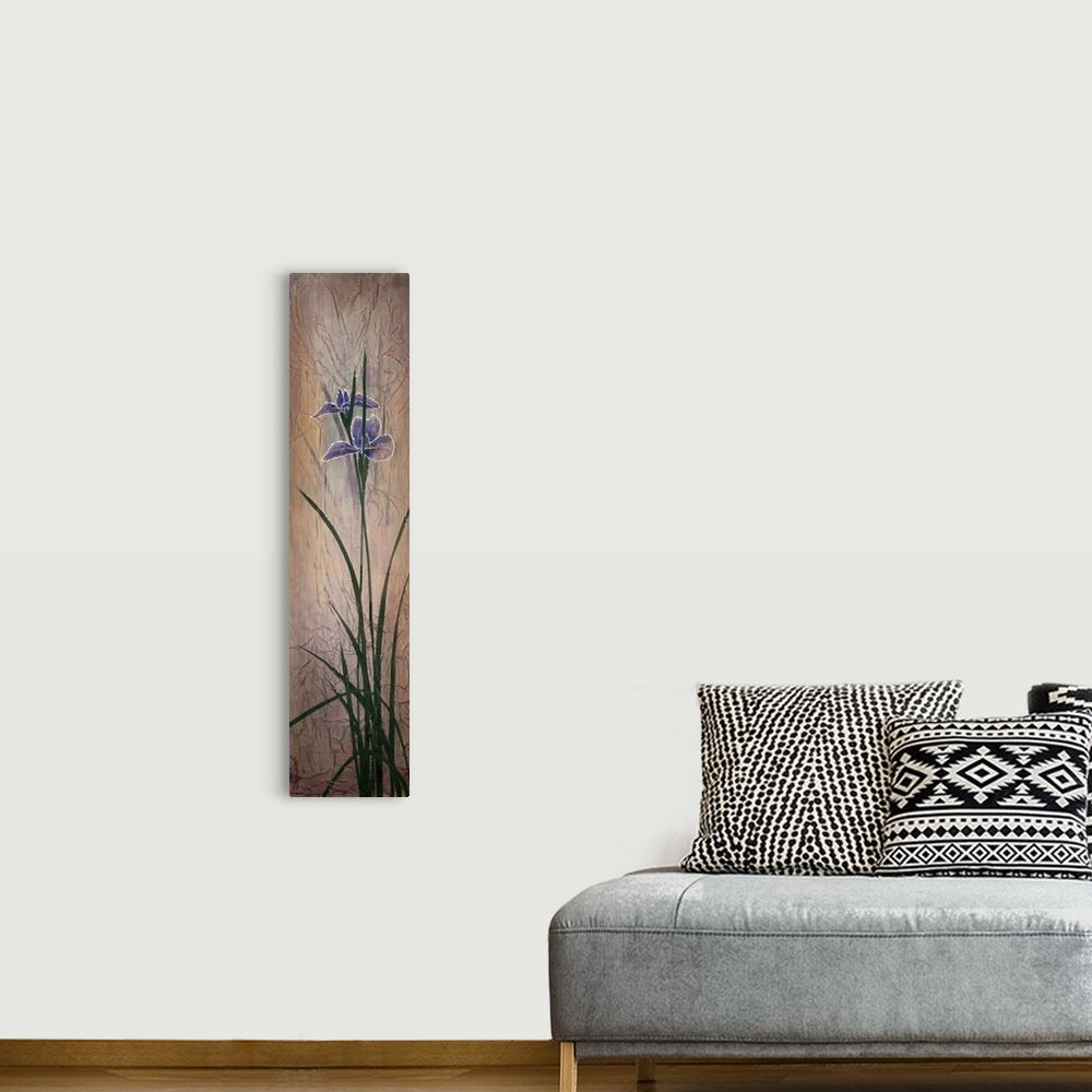A bohemian room featuring A long, slim vertical painting of a group of purple irises on a neutral backdrop with small faint...