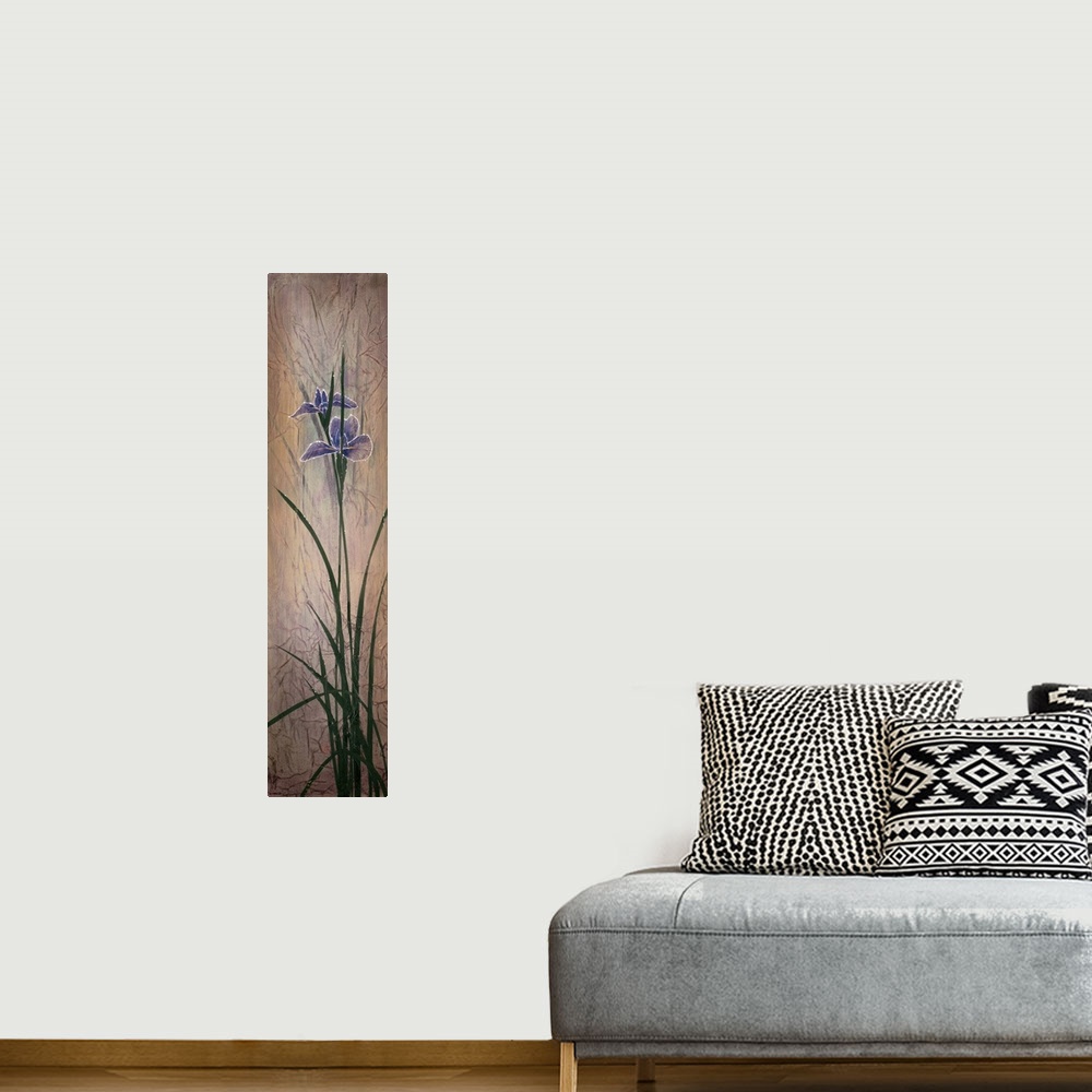 A bohemian room featuring A long, slim vertical painting of a group of purple irises on a neutral backdrop with small faint...