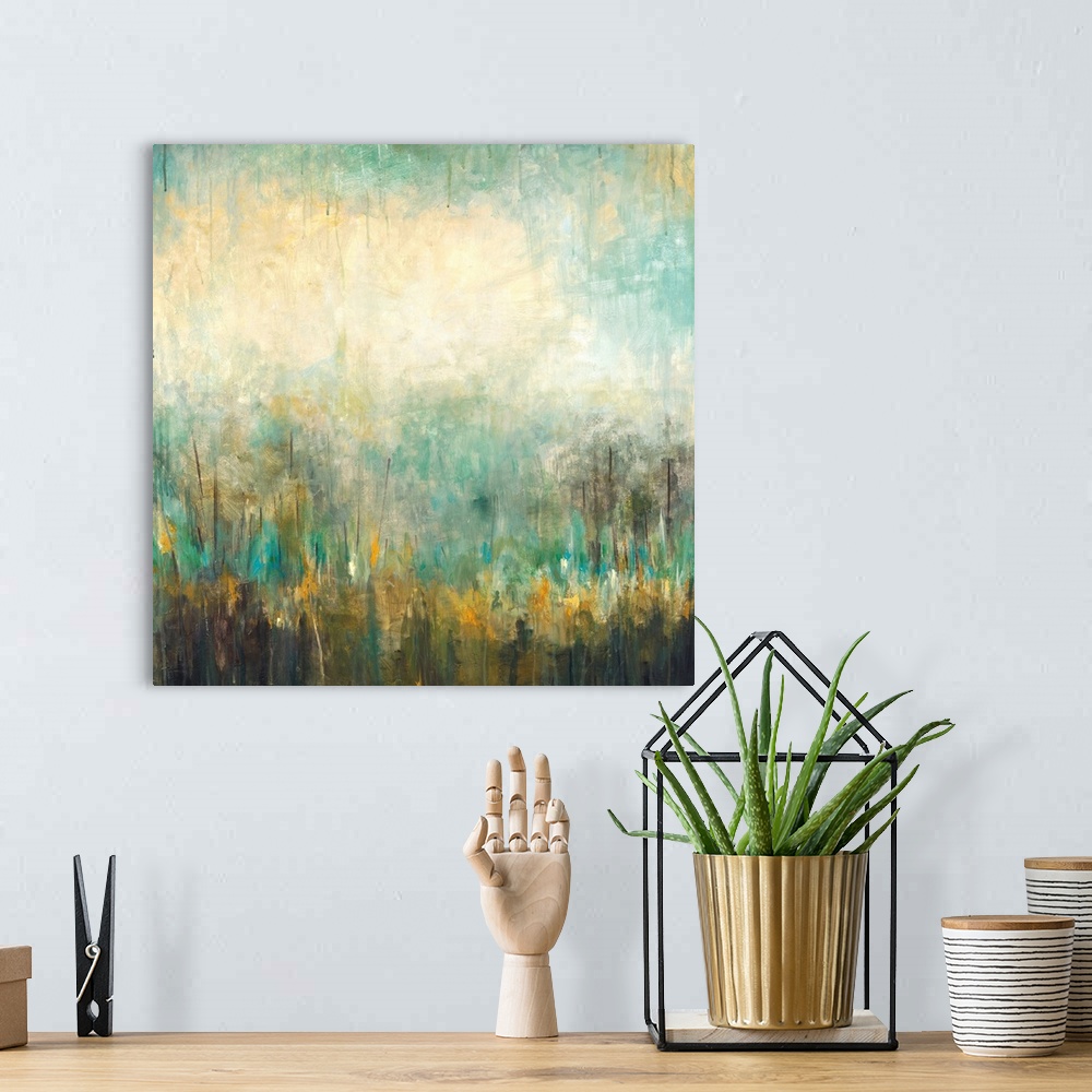 A bohemian room featuring Square abstract painting in textured colors of green, yellow, blue and gray.